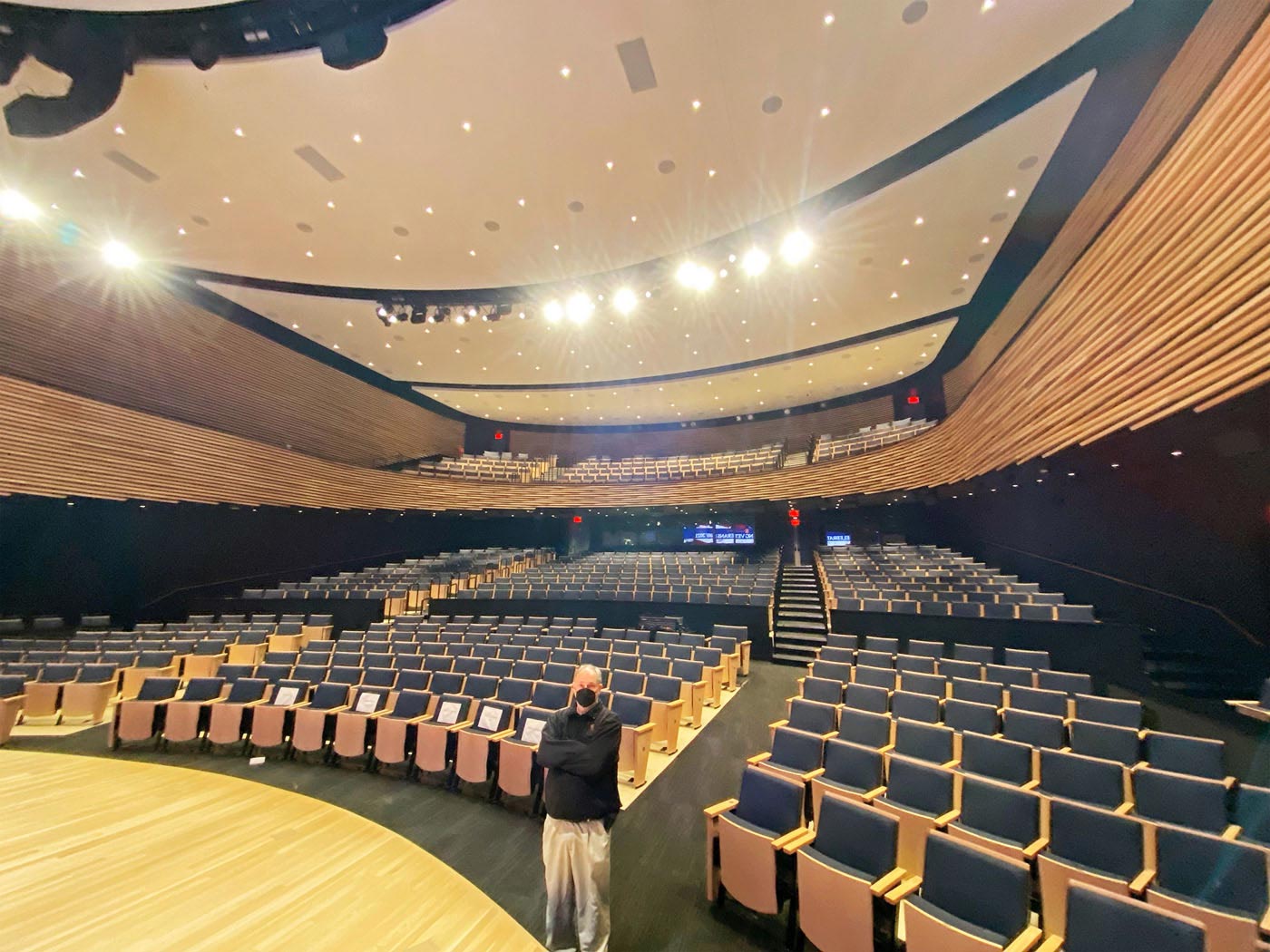 The two-tiered design of the auditorium maximized seating for hosted public and invitation-only private events.