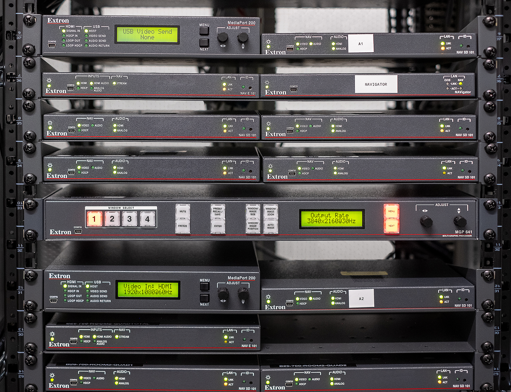 The well-organized central AV equipment rack simplifies installation, maintenance, and troubleshooting.