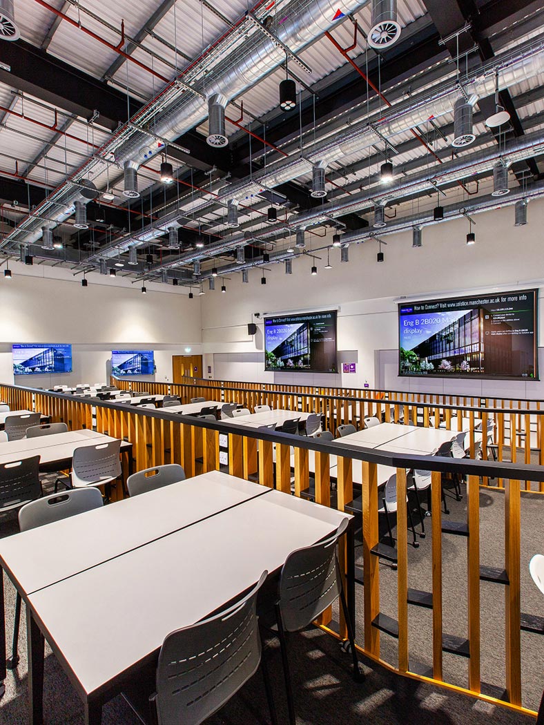 On the lecture side of Blended Theater 2, each of the seven student workstations is associated with a 2x2 videowall to augment visibility and enhance collaboration.