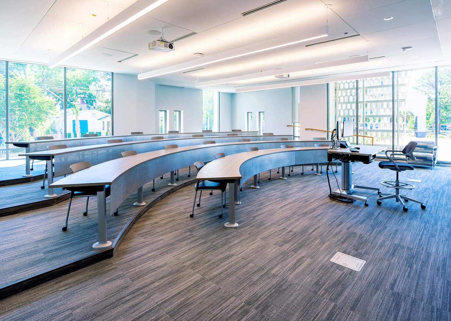 Standard classroom with tiered student seating.