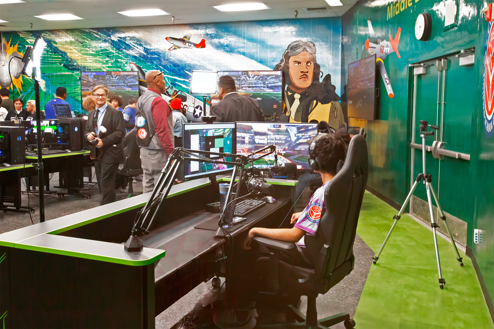 When a player’s avatar is knocked out of a match, the esports athlete can watch their team’s continuing action on the large screen displays.