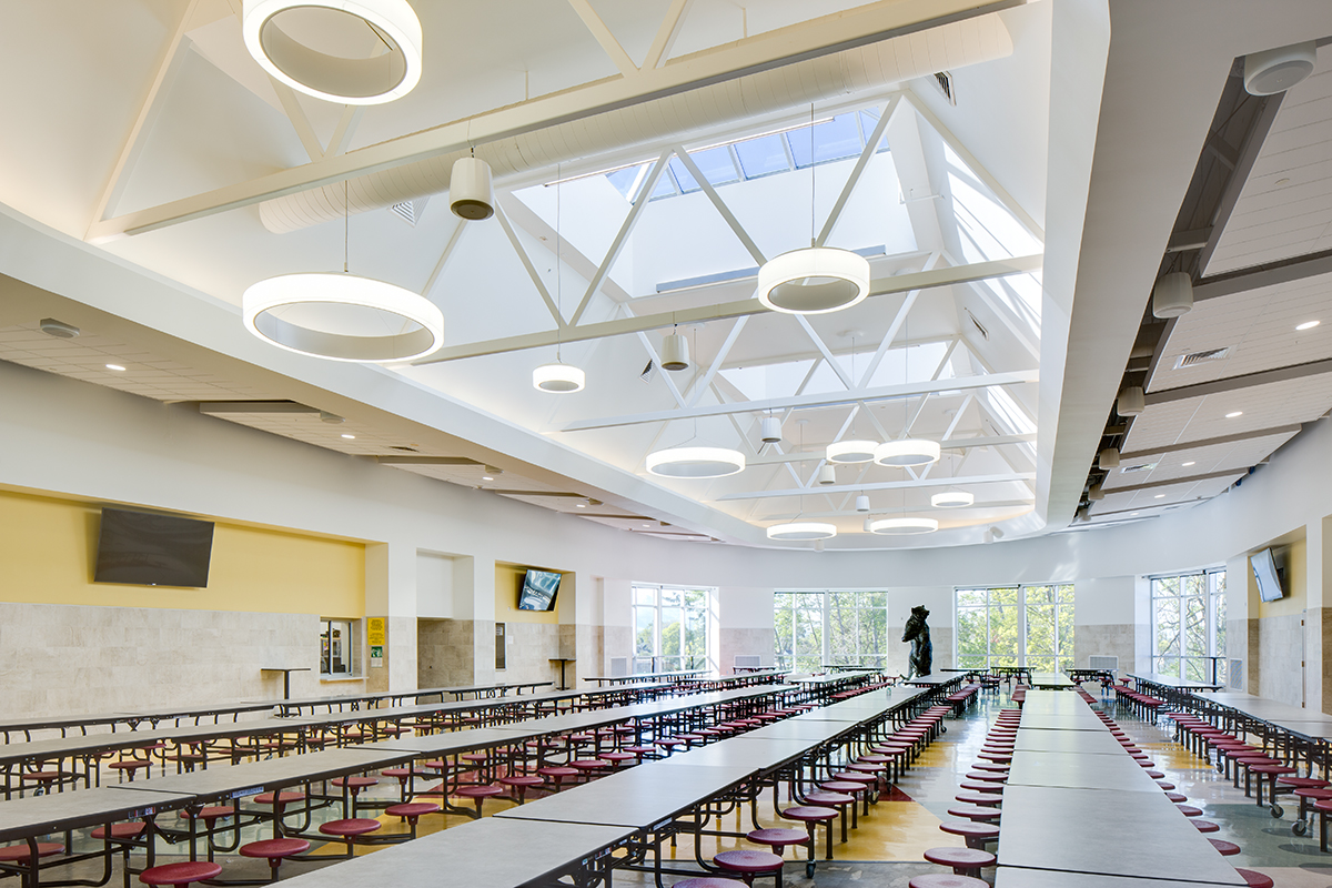 Common area with flat panel displays mounted on wall